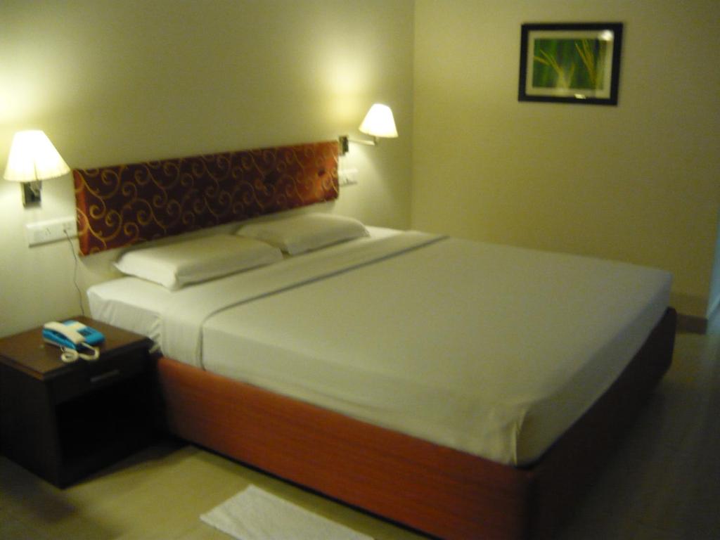 Postel nebo postele na pokoji v ubytování Hotel Malainn