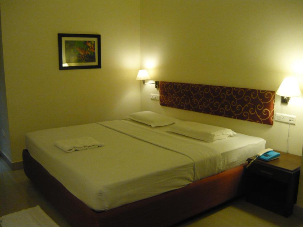 Postel nebo postele na pokoji v ubytování Hotel Malainn