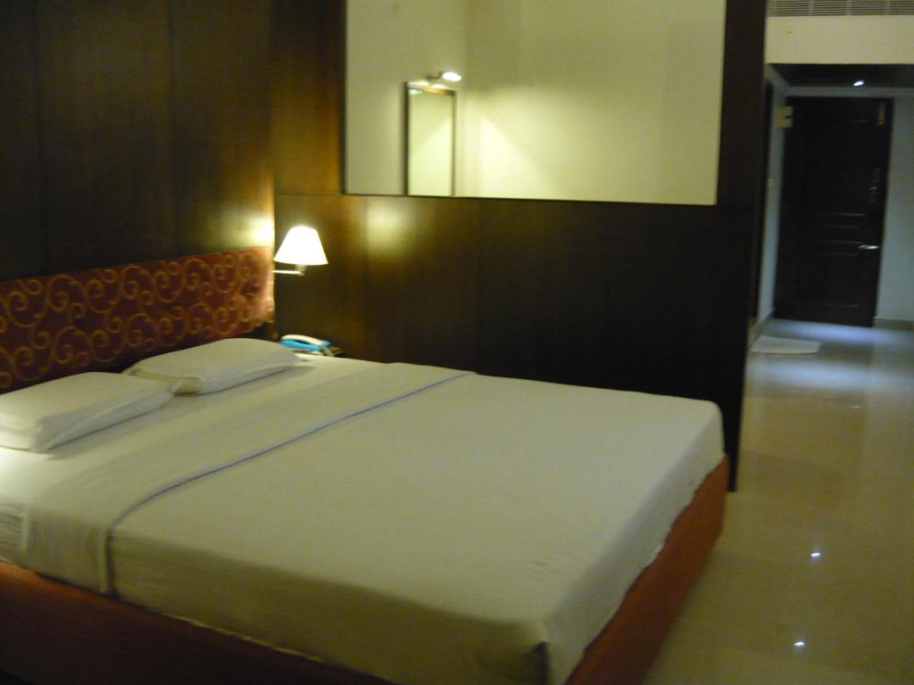 Postel nebo postele na pokoji v ubytování Hotel Malainn