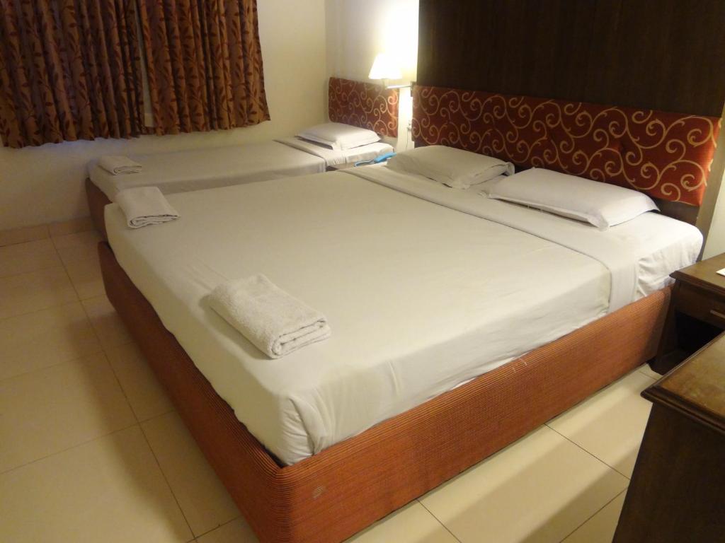 Postel nebo postele na pokoji v ubytování Hotel Malainn