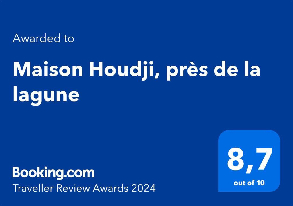 um ecrã azul com as palavras malcolm hudolph pses de la em Maison Houdji, près de la lagune em Cotonou