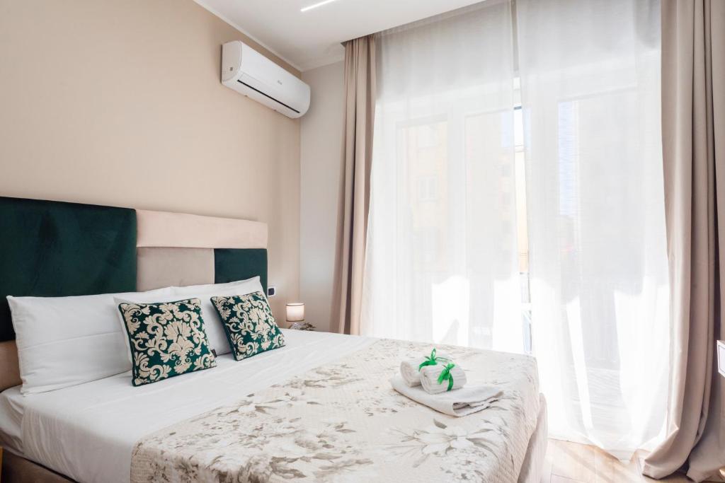 Postel nebo postele na pokoji v ubytování MarGab B&B