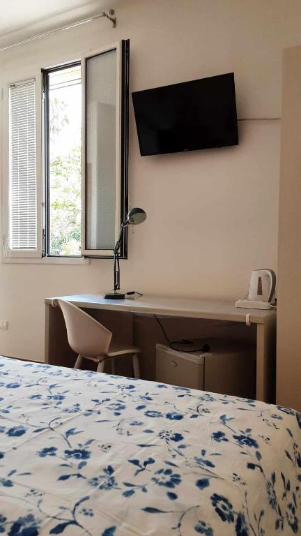 Postel nebo postele na pokoji v ubytování B&B Salvo e Terry