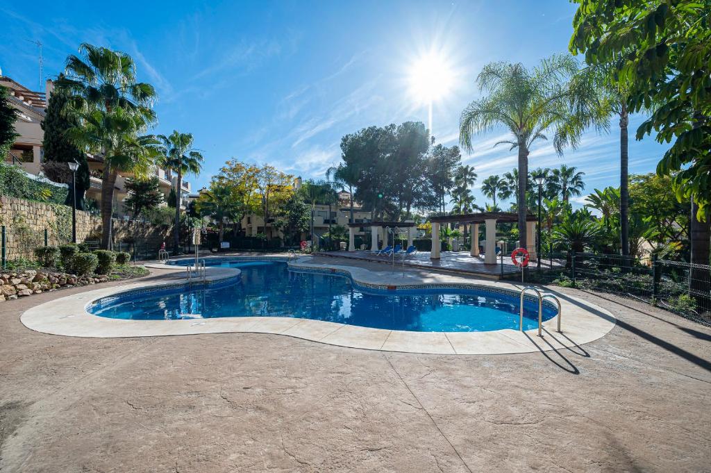 Bazén v ubytovaní Renovated in 2024 - Apartment with Pool and Parking alebo v jeho blízkosti