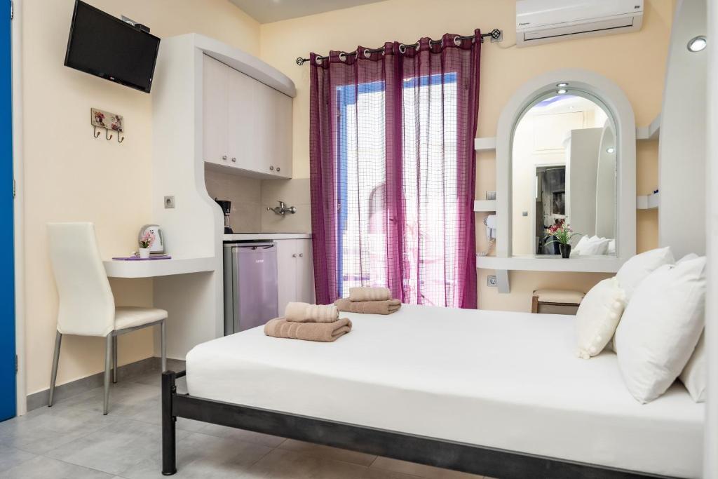 Posteľ alebo postele v izbe v ubytovaní Lefkes Studios