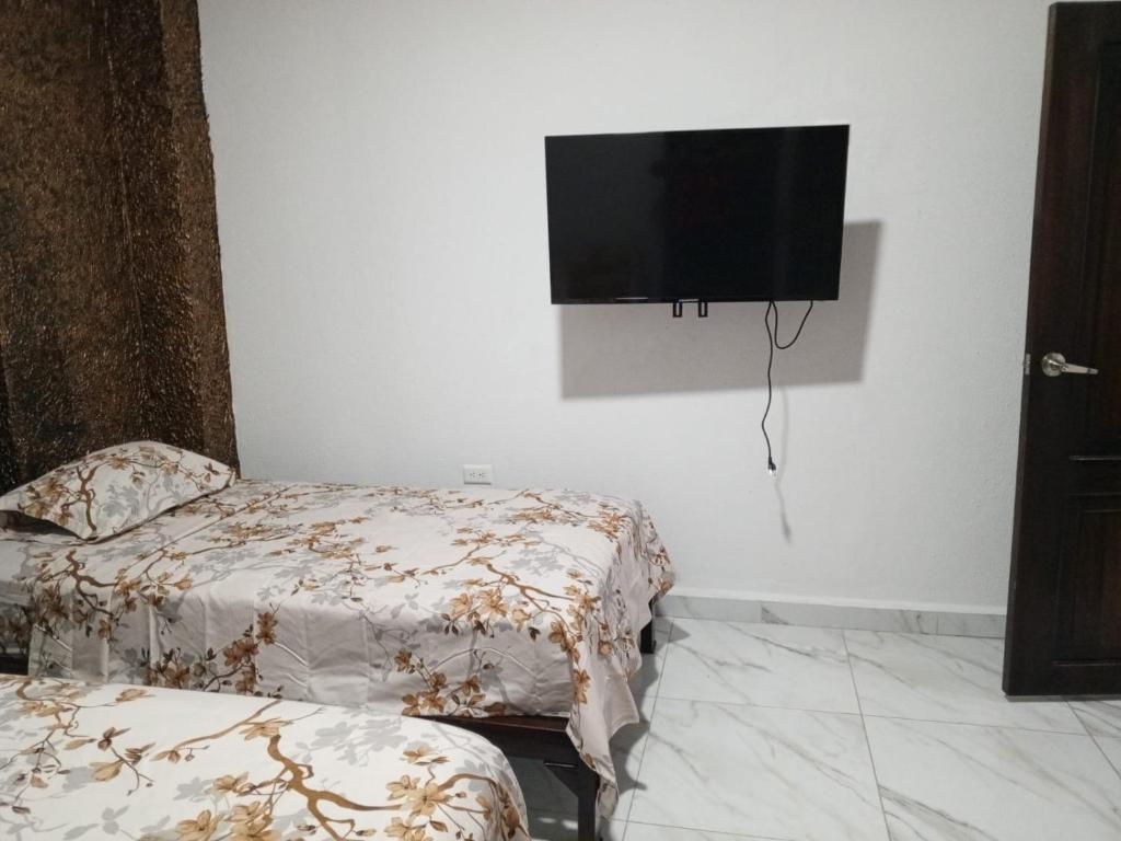 Кровать или кровати в номере Casa Palmamar