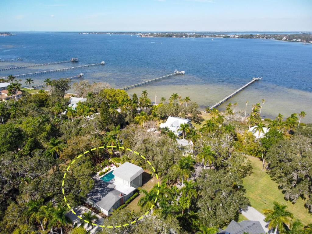 an aerial view of a house with the water at The River House in Bradenton