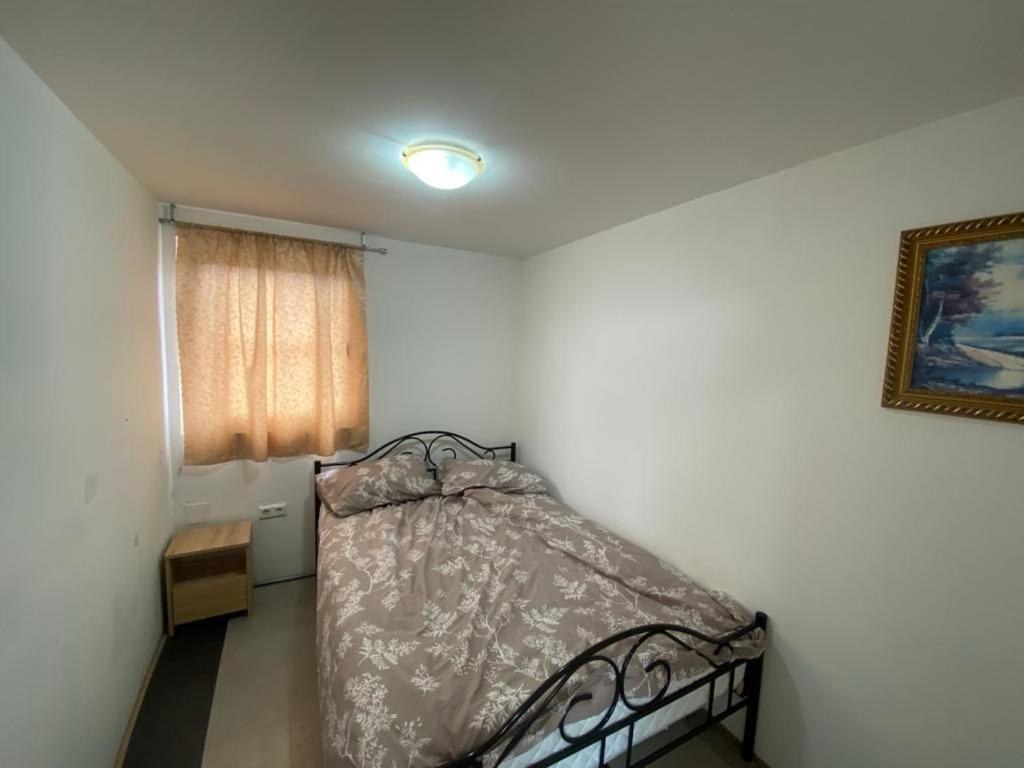 Säng eller sängar i ett rum på Kuća SFRJ Šamac