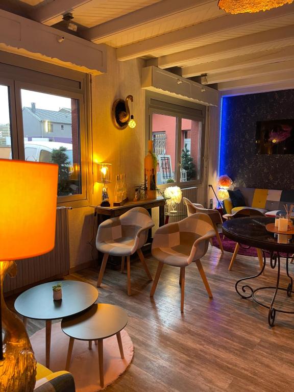 Posezení v ubytování Relais Vosgien - Hôtel Restaurant "la Table de Sophia"