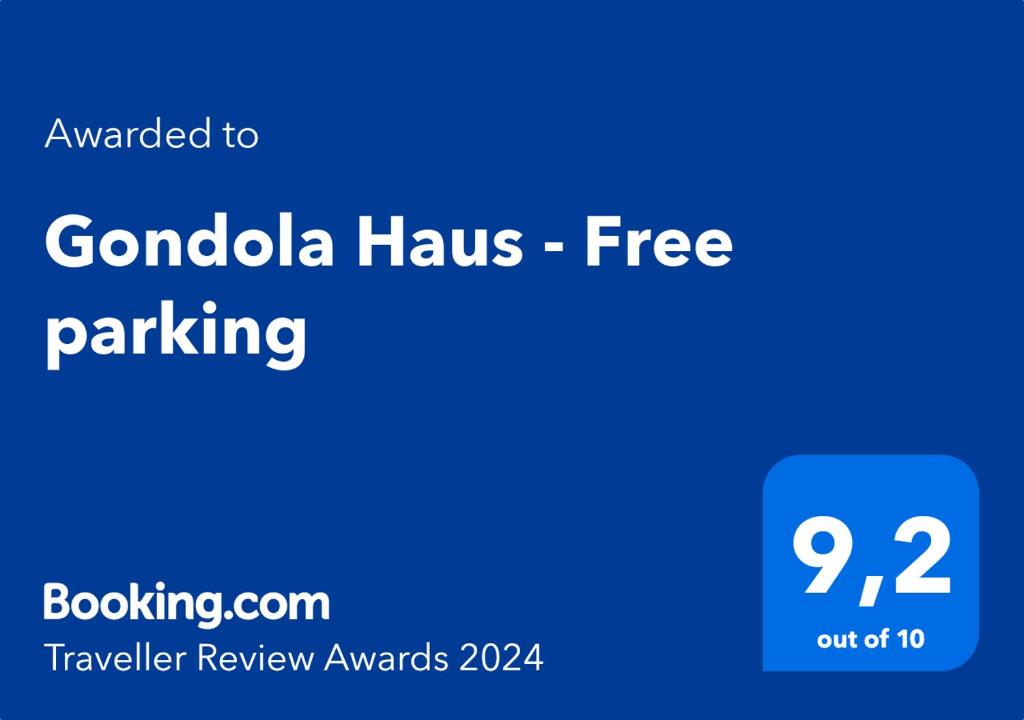 un cartel azul con las palabras gonzalo haus aparcamiento gratuito en Gondola Haus - Free parking, en Whistler