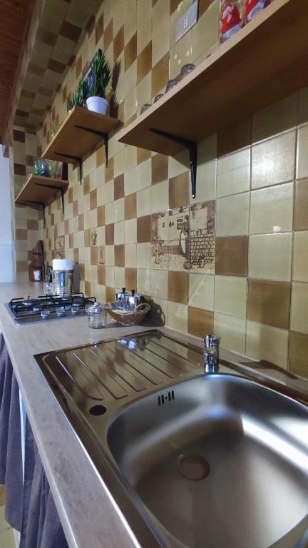 Kuchyň nebo kuchyňský kout v ubytování Casa Di Mitri