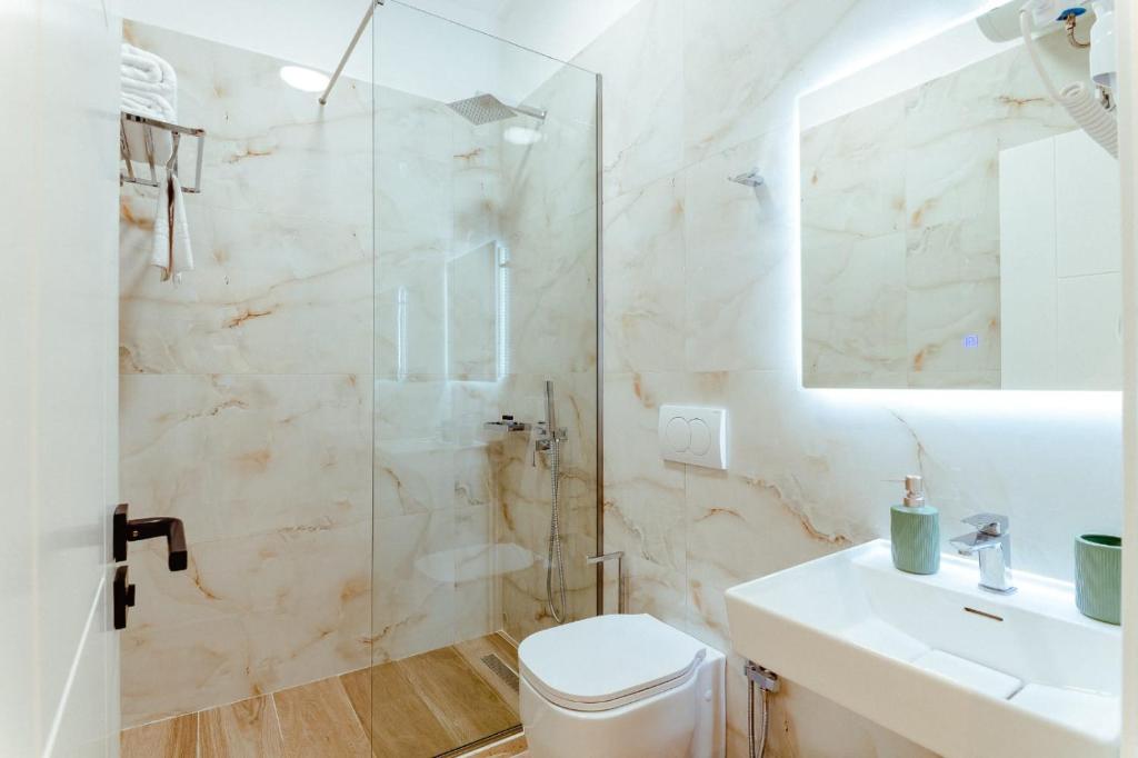 Koupelna v ubytování Gloal Suites & Residence
