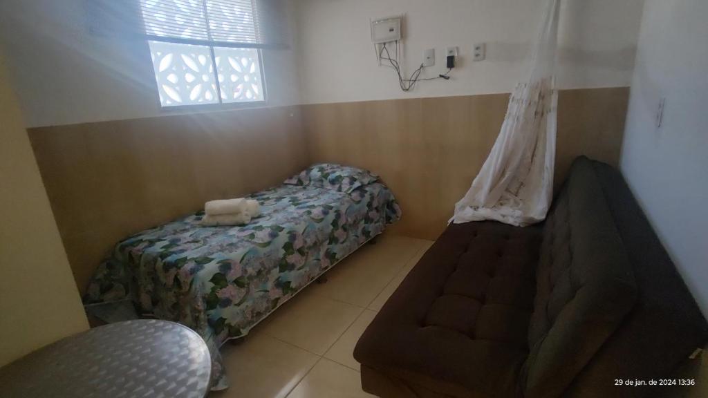 Postel nebo postele na pokoji v ubytování Casa mobiliada de 1 quarto na R Oliveira Alves Fontes, 597 - 597 A - Jardim Gonzaga