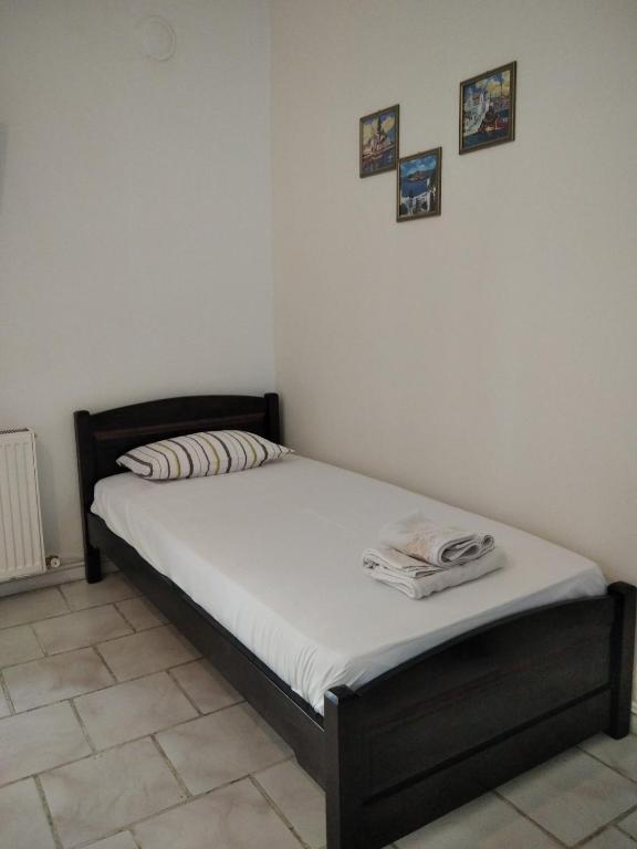 Postel nebo postele na pokoji v ubytování Labyrinthos Apartments