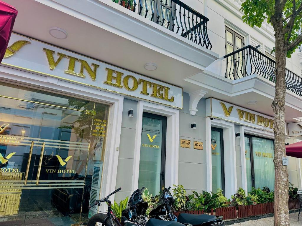 a vin hotel with motorcycles parked outside of it at VIN HOTEL in Vĩnh Long