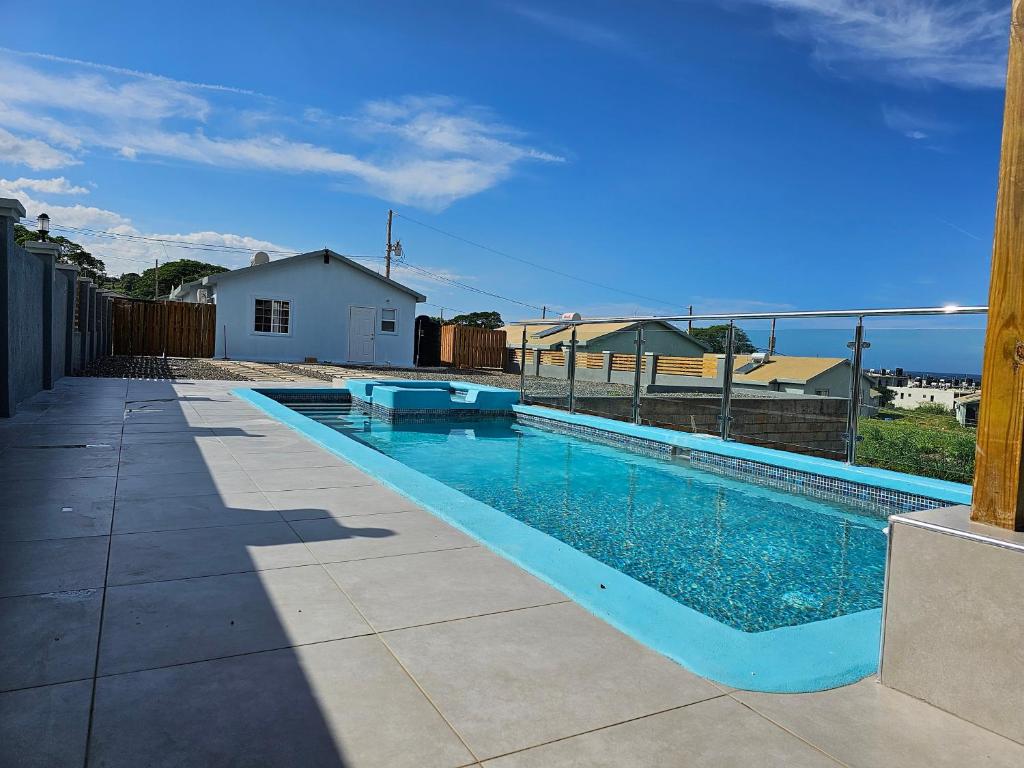 The swimming pool at or close to Luxury Ocean View Villa with Backyard Pool
