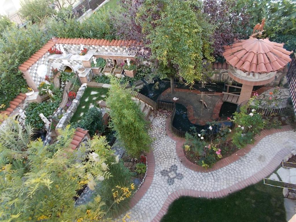 an aerial view of a garden with a gazebo at B&B Il Giardino Acquatico in Coppito