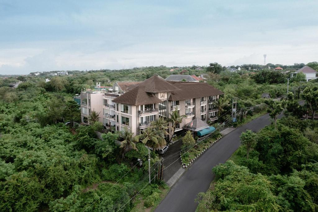 an overhead view of a building with a road at Amaroossa Suite Bali in Nusa Dua