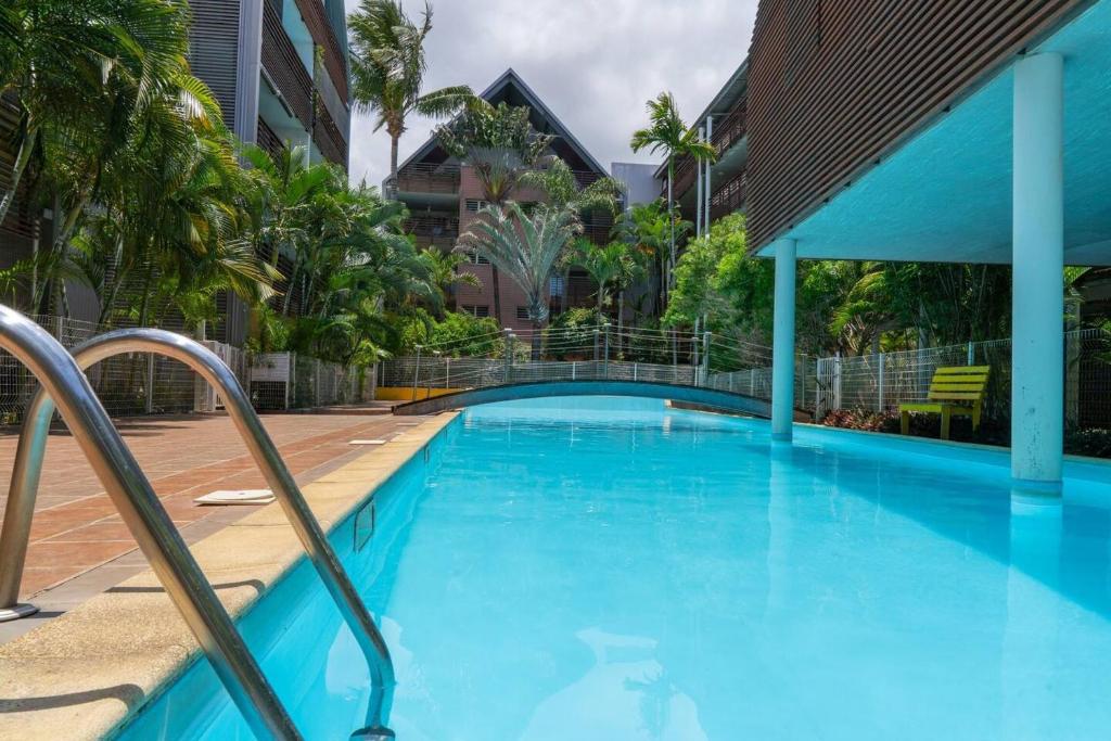 A piscina localizada em Appartement d'une chambre a Centre Ville a 700 m de la plage avec piscine partagee et wifi ou nos arredores