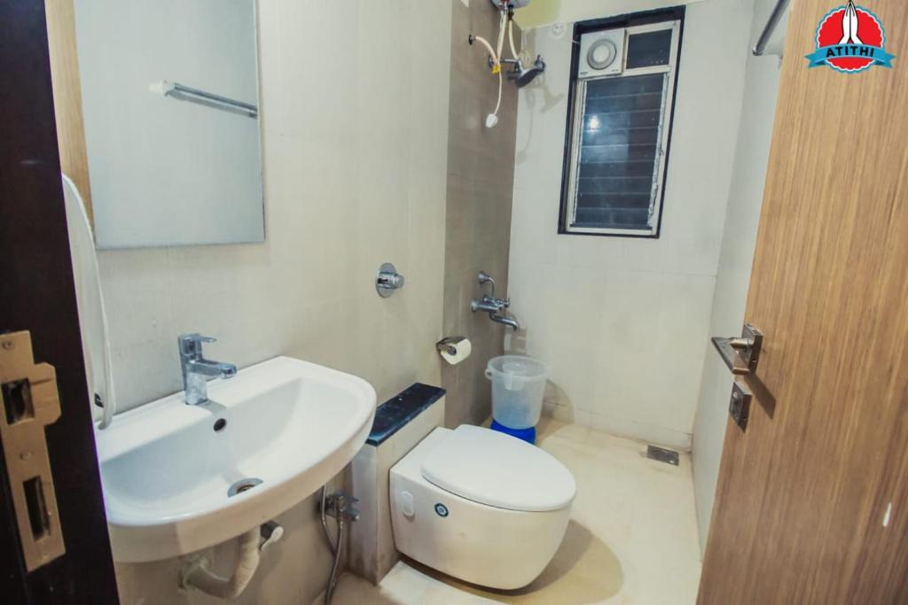 Koupelna v ubytování Atithi Service Apartment