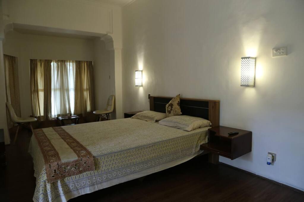 Кровать или кровати в номере Sunny Villa