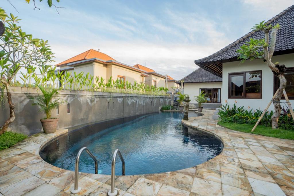 Bazén v ubytování Oma Ubud nebo v jeho okolí