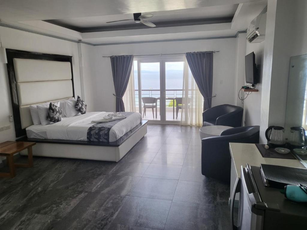 Postel nebo postele na pokoji v ubytování Manarra Sea View Resort