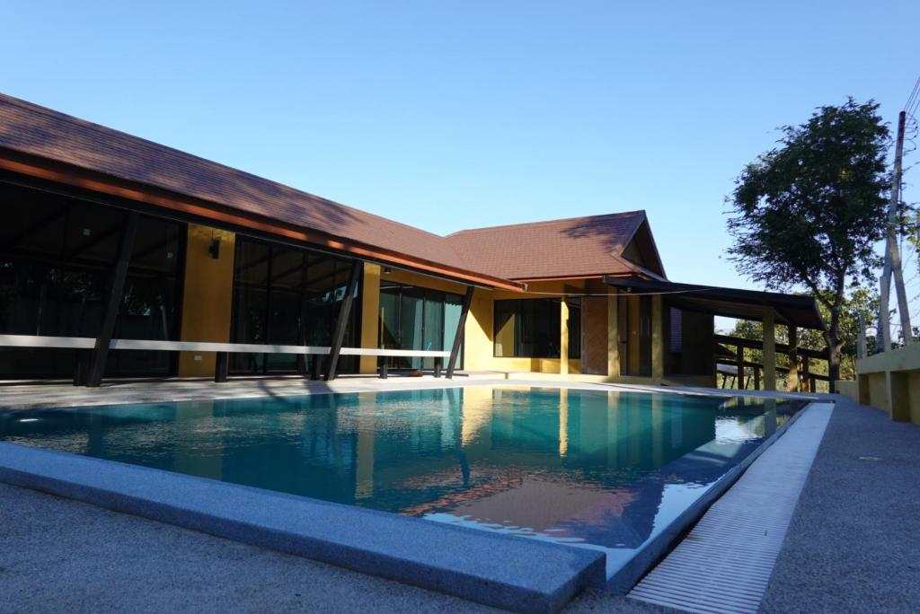 Bazén v ubytování Kavin Residence nebo v jeho okolí