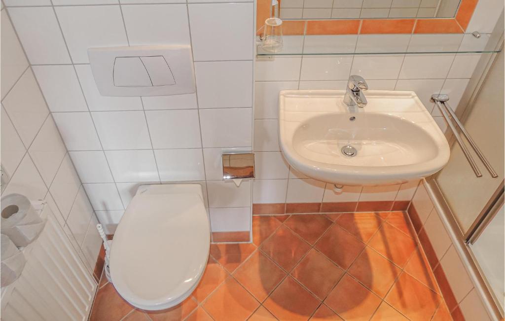 Kúpeľňa v ubytovaní Ferienwohnung Mit Badeteich