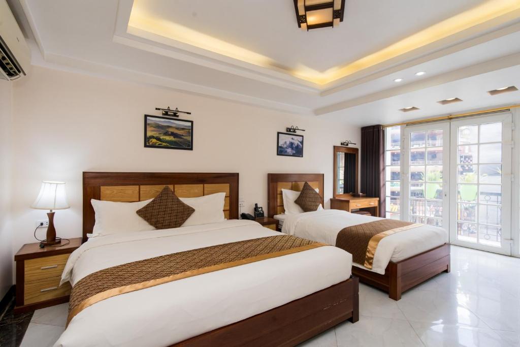 Postelja oz. postelje v sobi nastanitve Sapa Paradise Hotel