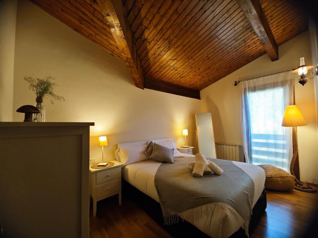 Postel nebo postele na pokoji v ubytování Can Geneta