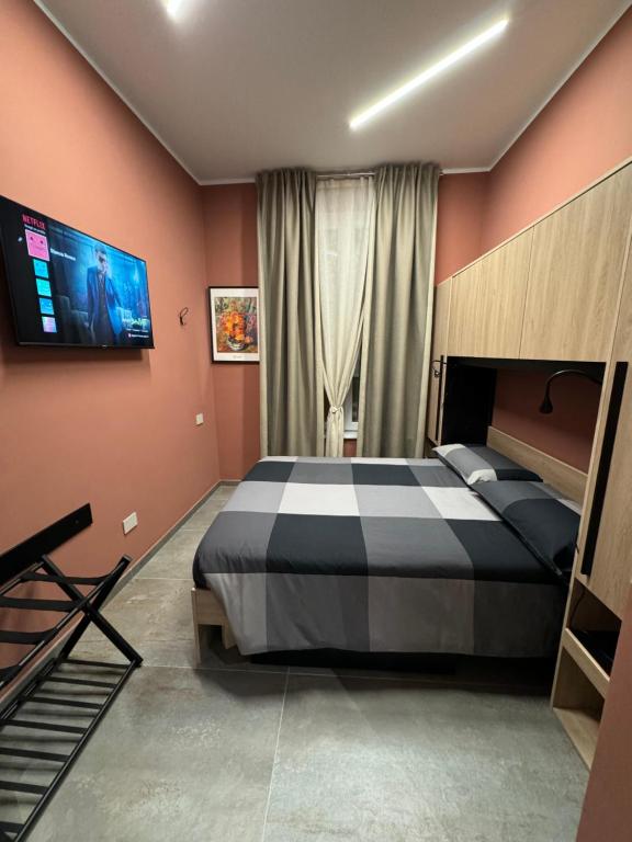 Postel nebo postele na pokoji v ubytování B&B Parma Centro