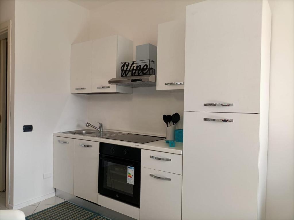 Kuchyň nebo kuchyňský kout v ubytování NABOO APARTMENT