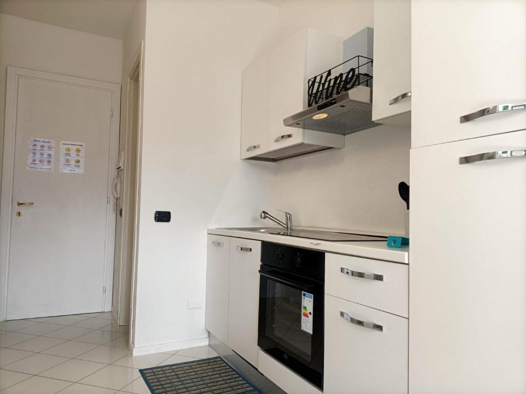 Kuchyň nebo kuchyňský kout v ubytování NABOO APARTMENT