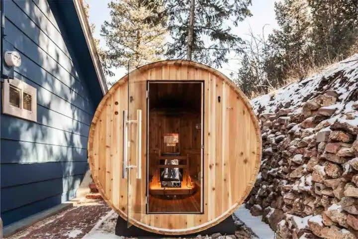 a wooden barrel house with a car in it at Cobalt Peak - Pet-Friendly Sauna Panoramic Views in Cascade-Chipita Park