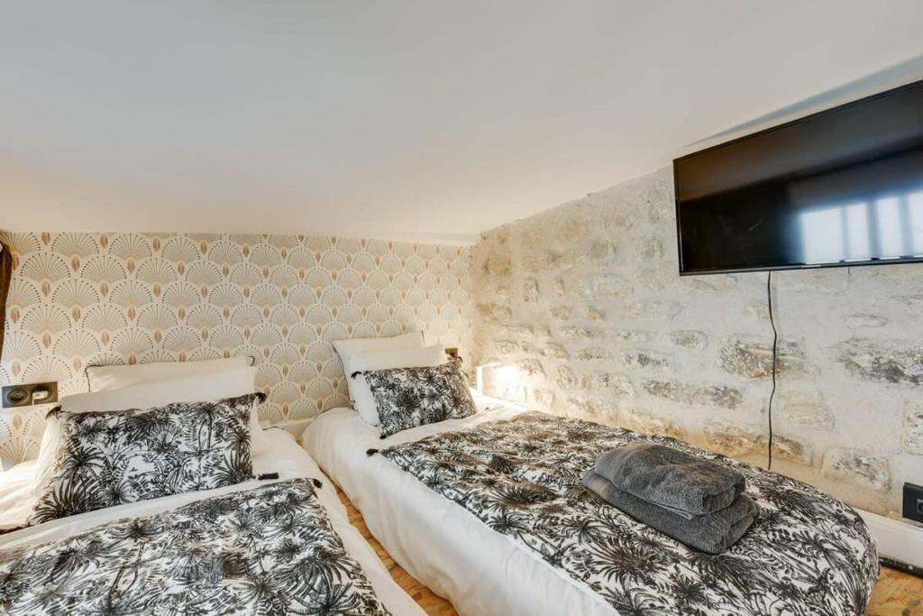 Posteľ alebo postele v izbe v ubytovaní Stylish and sunny 7BD with garden for 17 guests!