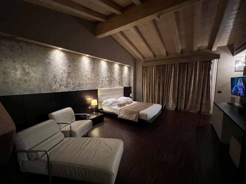 Postel nebo postele na pokoji v ubytování OneMhotel