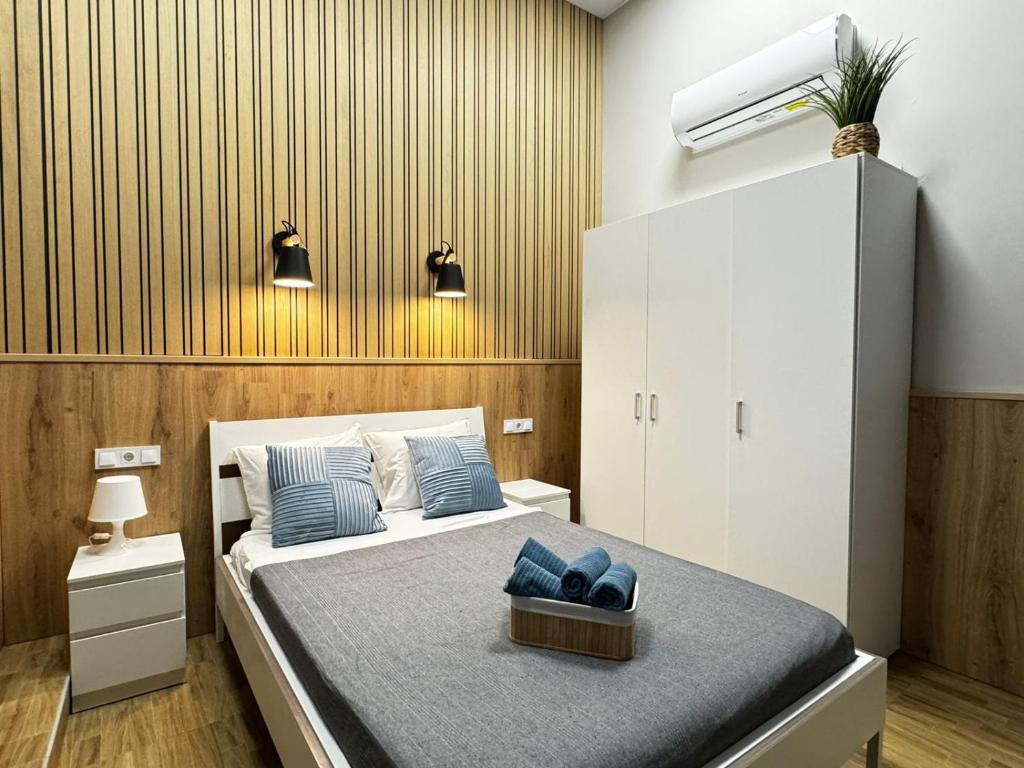 Postel nebo postele na pokoji v ubytování Grandera Apart`s - Lliri 32