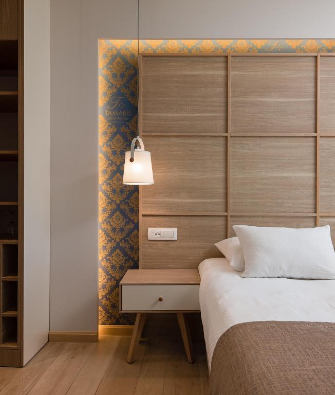 Postel nebo postele na pokoji v ubytování Hotel Tamaris