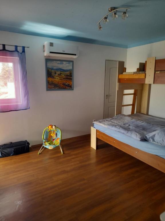 Posteľ alebo postele v izbe v ubytovaní Ferienhaus Judit