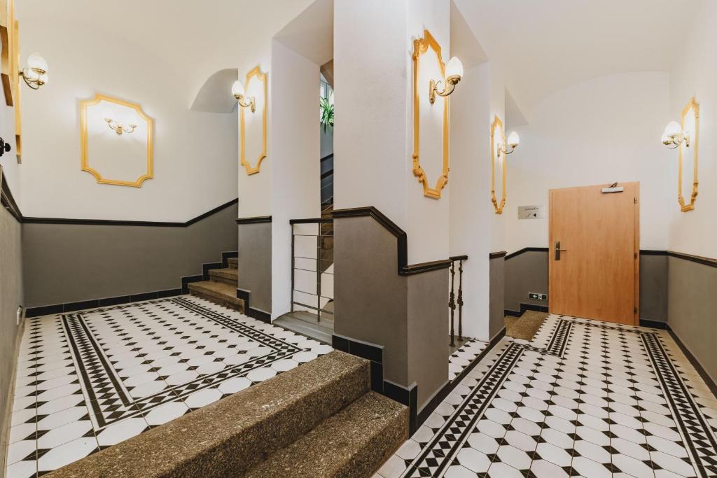 Postel nebo postele na pokoji v ubytování Grand Tábor
