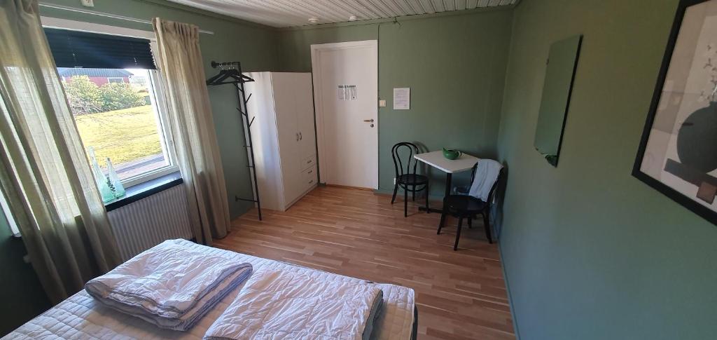 Postel nebo postele na pokoji v ubytování Ängdala Camping på Österlen
