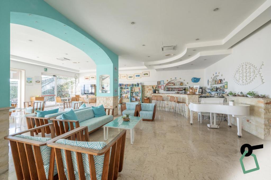Restaurace v ubytování HOTIDAY Room Collection - Leuca Lungomare