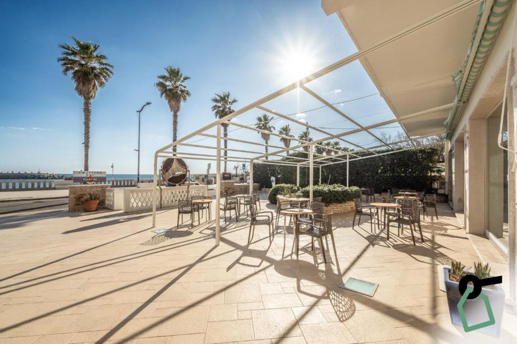 Balkón nebo terasa v ubytování HOTIDAY Room Collection - Leuca Lungomare