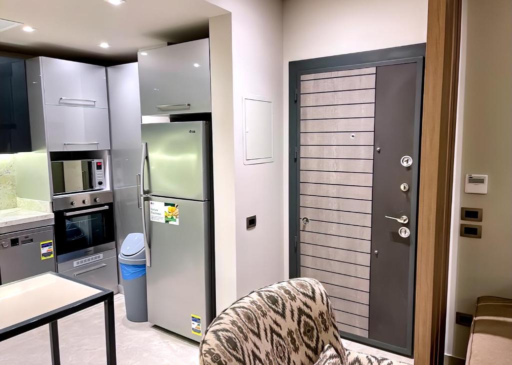 Kuchyň nebo kuchyňský kout v ubytování شقة فندقية الشيخ زايد - Zayed Suites C