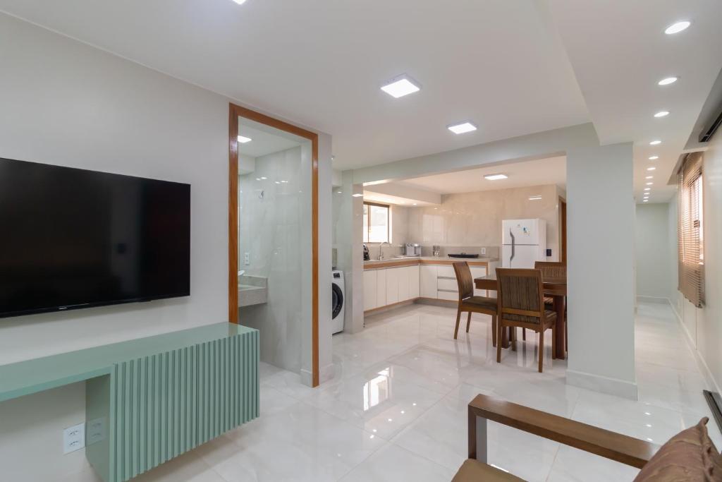TV tai viihdekeskus majoituspaikassa Residencial Oliveiras - Apartamento 3