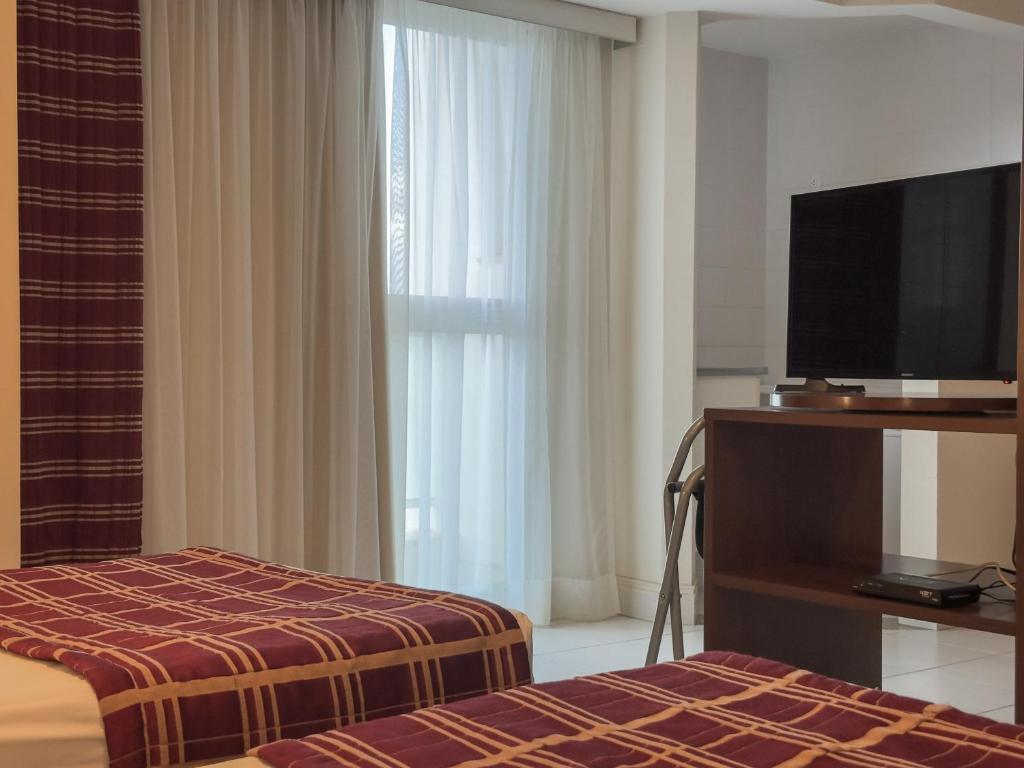 TV a/nebo společenská místnost v ubytování Hotel Cianorte Diamond