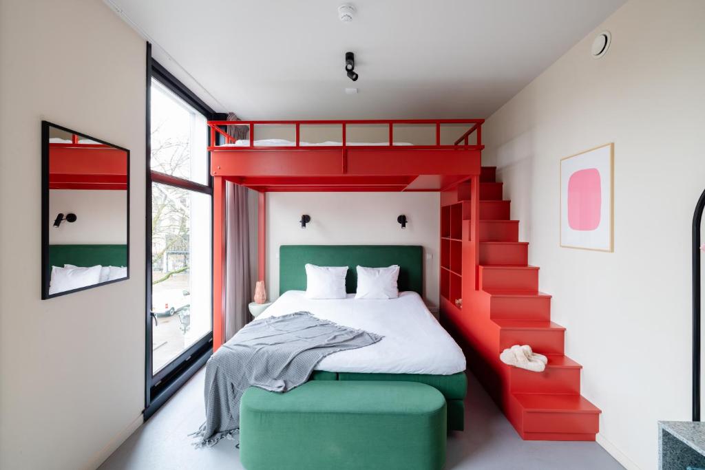 Llit o llits en una habitació de Hotel Unplugged