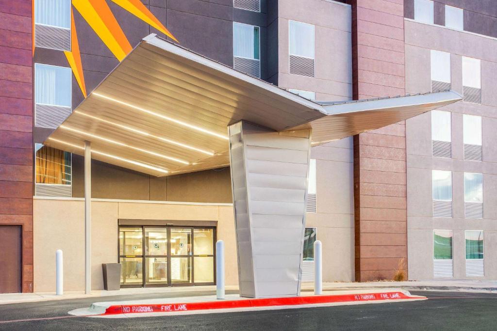 a facade of a building with a sculpture on it at La Quinta by Wyndham Lubbock West Medical Center in Lubbock