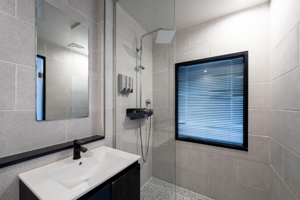 Koupelna v ubytování Gray 193 Hotel